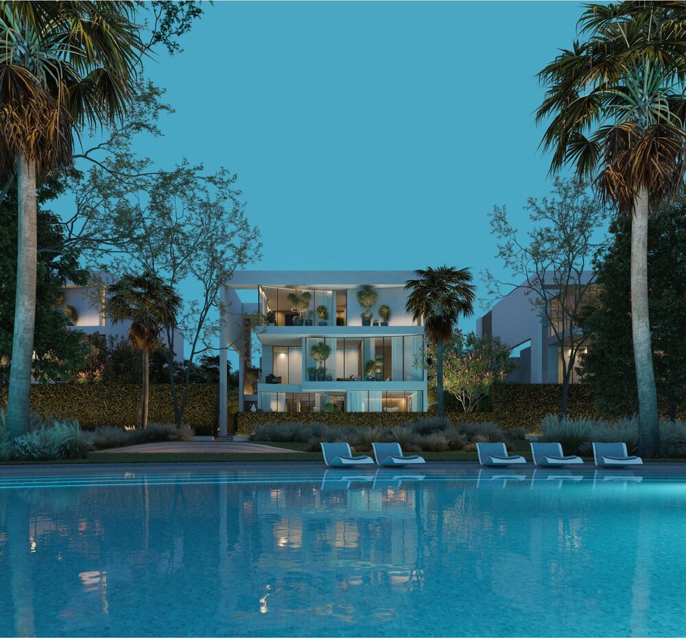 The Rise maisonette at dusk beside the lagoon pool